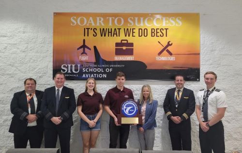 group photos of the Southern Illinois University Air Line Pilots Association, International Aviation Collegiate Education (SIU ALPA ACE) Club members
